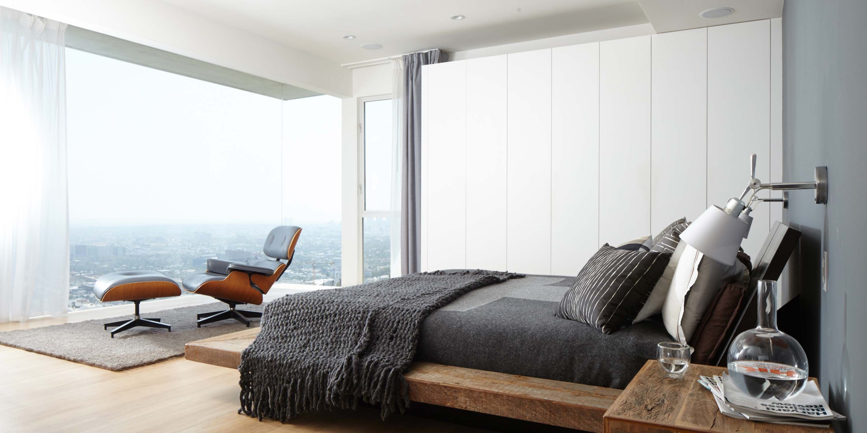 savant bedroom with white tones and modern furniture